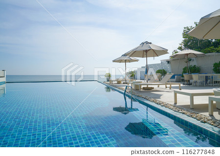 bed pool around swimming pool with sea background 116277848