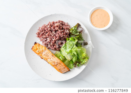 grilled salmon fillet steak with rice berry and vegetable 116277849