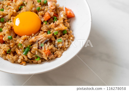salmon fried rice with pickled egg on top salmon fried rice with pickled egg on top 116278058