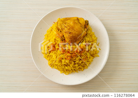 Chicken Biryani or Curried rice and chicken - Thai-Muslim version of Indian biryani, with fragrant yellow rice and chicken 116278064