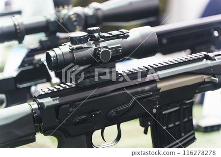 Modern weapons automatic rifles and machine gun on the counter. Firearms for the army and police Modern weapons automatic rifles and machine gun on the counter. Firearms for the army and police 116278278