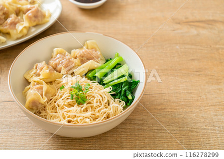dried egg noodles with pork wonton or pork dumplings without soup 116278299