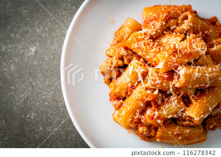 Rigatoni pasta bolognese with cheese Rigatoni pasta bolognese with cheese 116278342