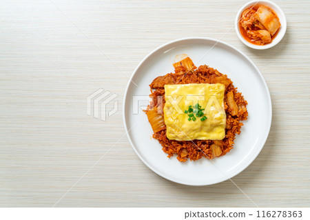 kimchi fried rice with pork and topped cheese kimchi fried rice with pork and topped cheese 116278363