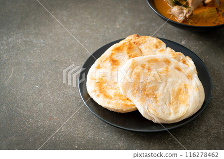 Chicken curry soup with roti Chicken curry soup with roti 116278462