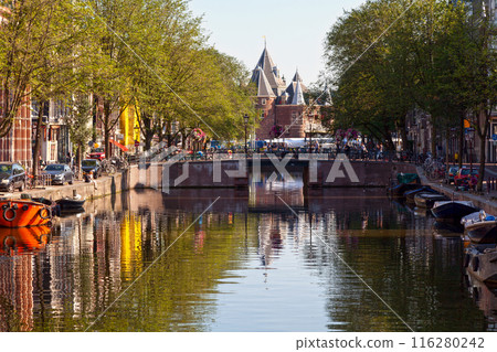 Canal opposite the Waag in Amsterdam 116280242