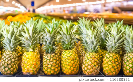 CG material: Image of pineapples being sold in a supermarket 116280551