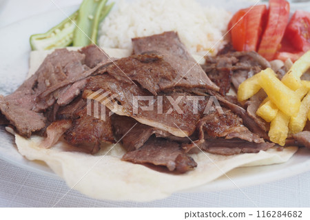 Tasty Doner Kebab with fresh vegetables, rice a delightful meal for lunch or dinner 116284682