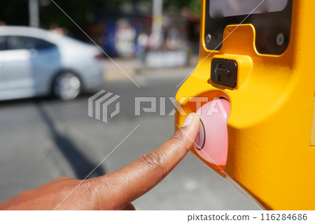 close up of crossing signal button  116284686