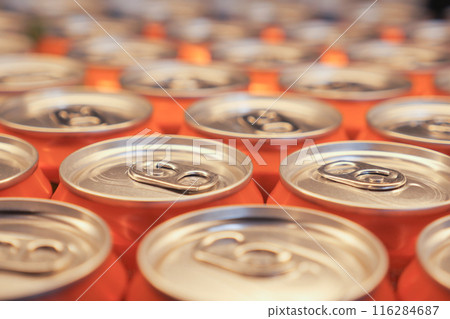 Cans of soft drink lined up , 116284687