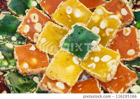 turkish delight or lokum of red, green, orange and yellow colors. turkish delight or lokum of red, green, orange and yellow colors. 116285166