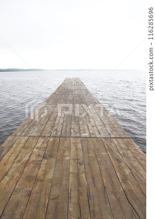 Pier jutting out into the lake 116285696
