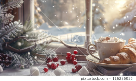 A cup of hot cocoa with marshmallows with a crispy and fresh croissant on a snowy windowsill and a fir branch and cranberries 116286035