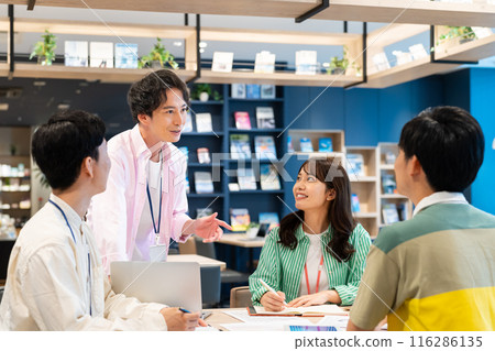 Businessmen in a meeting. Photo courtesy of Creadisce (Maruzen-Yushodo Co., Ltd.). 116286135