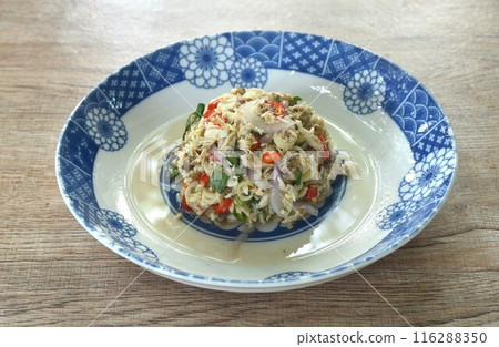 spicy and sour chop steamed mackerel with herb Thai salad on plate spicy and sour chop steamed mackerel with herb Thai salad on plate 116288350