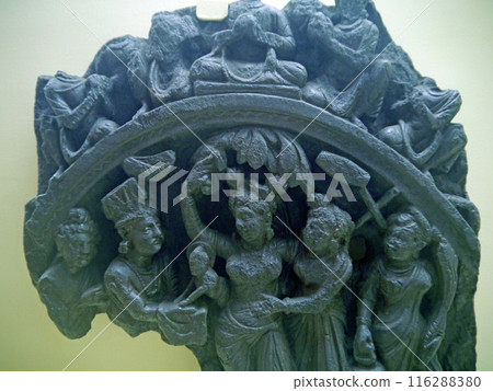 A small sculpture depicting the birth of Buddha from Gandhara on display at the Calcutta Museum in India 116288380