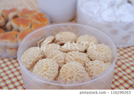 Kue Lebaran is an Assorted Indonesian specialty cookies for Eid al-Fitr or Eid Mubarak. such as Nastar, snow white, kaastengels and thumbprint cookies. 116290263