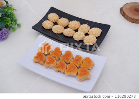 Kue Lebaran is an Assorted Indonesian specialty cookies for Eid al-Fitr or Eid Mubarak. such as Nastar, snow white, kaastengels and thumbprint cookies. 116290278