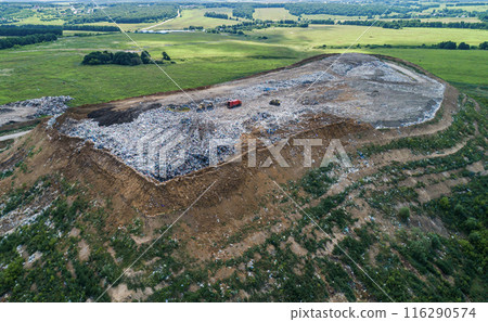 Aerial view of a landfill filled with waste in the daytime 116290574