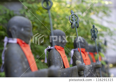 Jizo statues lined up along the approach to Tsubosaka Temple Jizo statues lined up along the approach to Tsubosaka Temple 116291315
