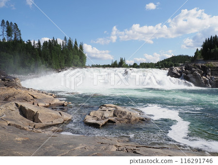 Panoramic Laksforsen waterfall at Vefsna river in Grane town in Norway Panoramic Laksforsen waterfall at Vefsna river in Grane town in Norway 116291746