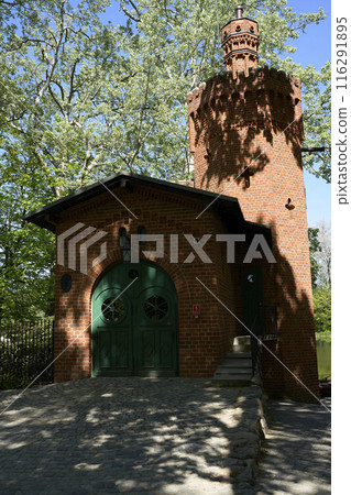 Neo-Gothic building of pump station in Wilanow in Warsaw city of Poland - vertical 116291895