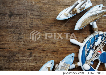 Nautical and summer background top view on wooden background Nautical and summer background top view on wooden background 116292040