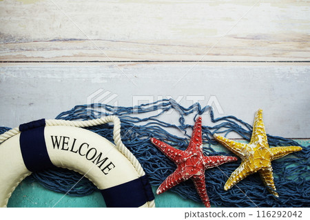 Nautical and summer background top view on wooden background Nautical and summer background top view on wooden background 116292042