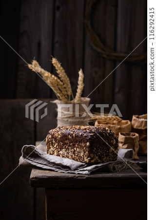 Loaf wholegrain bread with seeds 116292415