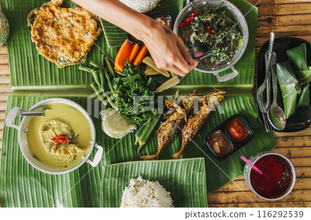 Nasi Hidang Kampung or traditional southern Thailand food in Pattani Nasi Hidang Kampung or traditional southern Thailand food in Pattani 116292539