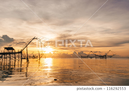 Villager large fish net lifting in Songkhla lake, Phatthalung, Thailand. Villager large fish net lifting in Songkhla lake, Phatthalung, Thailand. 116292553