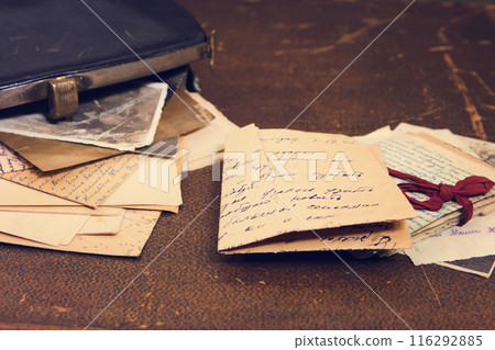 Postal letters in the vintage handbag 116292885