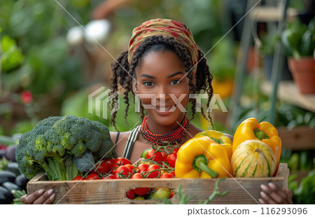 Woman holding wooden box full fresh vegetables. Basket vegetable. Agriculture harvest 116293096