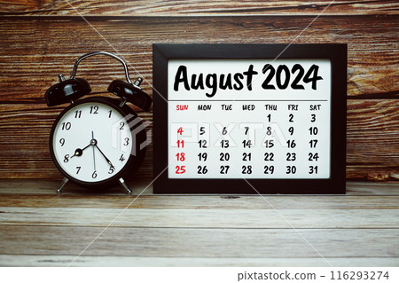 AUGUST 2024 monthly calendar for planning and management concept with alarm clock on wooden background 116293274