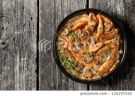 chicken stroganoff in a baking dish, top view 116293326