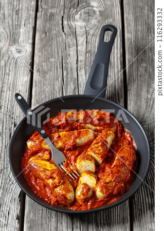 German Currywurst, pork sausages in a curry sauce 116293332