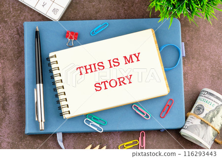 Business and This is my Story concept. Copy space. Words THIS IS MY STORY in the businessman's notebook 116293443