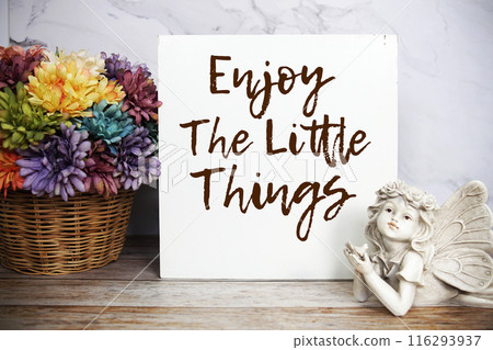 Enjoy the Little things text message with alarm clock on wooden background, Inspriation and motivationa quote Enjoy the Little things text message with alarm clock on wooden background, Inspriation and motivationa quote 116293937