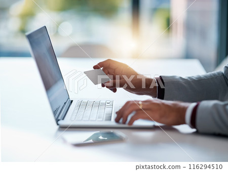 Businessman, hands and credit card with laptop for ecommerce, online shopping or banking investment. Fintech, professional trader and digital finance with typing, loan application or budget in office 116294510