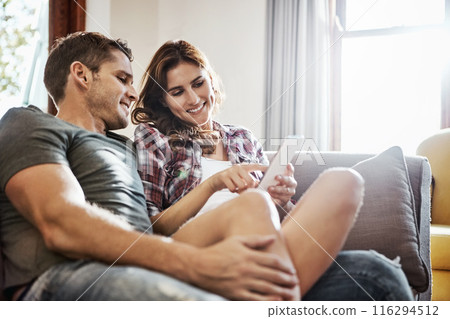 Phone, relax and smile with couple on sofa in living room of home together for communication or social media. App, break or love with happy man and woman in apartment for browsing or networking Phone, relax and smile with couple on sofa in living room of home together for communication or social media. App, break or love with happy man and woman in apartment for browsing or networking 116294512