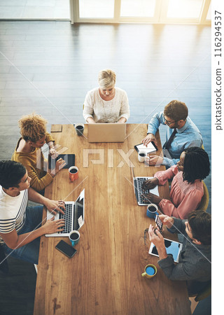 Office, teamwork and above of business people in discussion, project feedback and planning. Creative agency, laptop and men and women with documents for meeting, collaboration and brainstorming Office, teamwork and above of business people in discussion, project feedback and planning. Creative agency, laptop and men and women with documents for meeting, collaboration and brainstorming 116294537