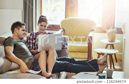 Couple, laptop and typing in living room, paperwork and document of loan, marriage and home on weekend morning. House, man and woman on sofa, bills and together in lounge, couch and happiness Couple, laptop and typing in living room, paperwork and document of loan, marriage and home on weekend morning. House, man and woman on sofa, bills and together in lounge, couch and happiness 116294674