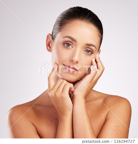 Skincare, hand and woman in studio with portrait for natural treatment, cosmetics or dermatology on white background. Spa, body and female model with shine for beauty, aesthetic or wellness results Skincare, hand and woman in studio with portrait for natural treatment, cosmetics or dermatology on white background. Spa, body and female model with shine for beauty, aesthetic or wellness results 116294727