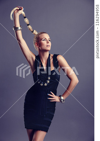 Woman, luxury fashion and confident in studio, clothes and cool hairstyle on gray background. Female person, runway and designer outfit for style inspiration, aesthetic and classy trend for wellness 116294958