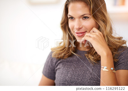 Woman, thinking and relax in home, living room and house on holiday or vacation. Smile, happy and thoughtful for ideas and vision or inspiration, calm and self care chill for female person in lounge 116295122