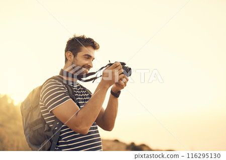 Outdoor, photography and man with camera, adventure and thinking with sunshine, equipment and memory. Person in forest, nature or guy with journey, photographer or getaway trip with research or smile 116295130
