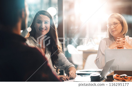 Smile, group and business people planning, discussion or brainstorming on laptop in startup at night. Team, collaboration and project strategy in meeting for creative editor with pizza on deadline 116295177