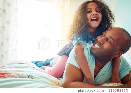 Man, dad and girl piggyback for love relationship with trust and fun support for growth in bedroom. Hug, happy and papa carry young child with playing together for development and happiness on bed Man, dad and girl piggyback for love relationship with trust and fun support for growth in bedroom. Hug, happy and papa carry young child with playing together for development and happiness on bed 116295255