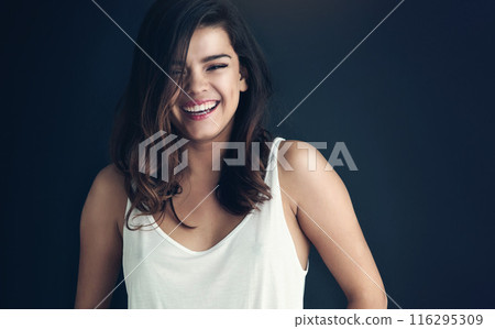 Smile, woman and studio for fashion and laugh, stylish and isolated on blue background. Casual clothing, thrifted and minimalistic for upcycling, portrait and happiness for female person from Brazil Smile, woman and studio for fashion and laugh, stylish and isolated on blue background. Casual clothing, thrifted and minimalistic for upcycling, portrait and happiness for female person from Brazil 116295309