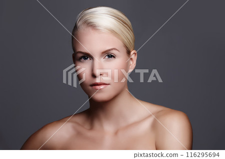 Portrait, skincare and woman in studio with beauty for facial glow, skin health and salon or spa aesthetic. Dermatology, model girl and cosmetics with wellness and natural makeup by grey background 116295694